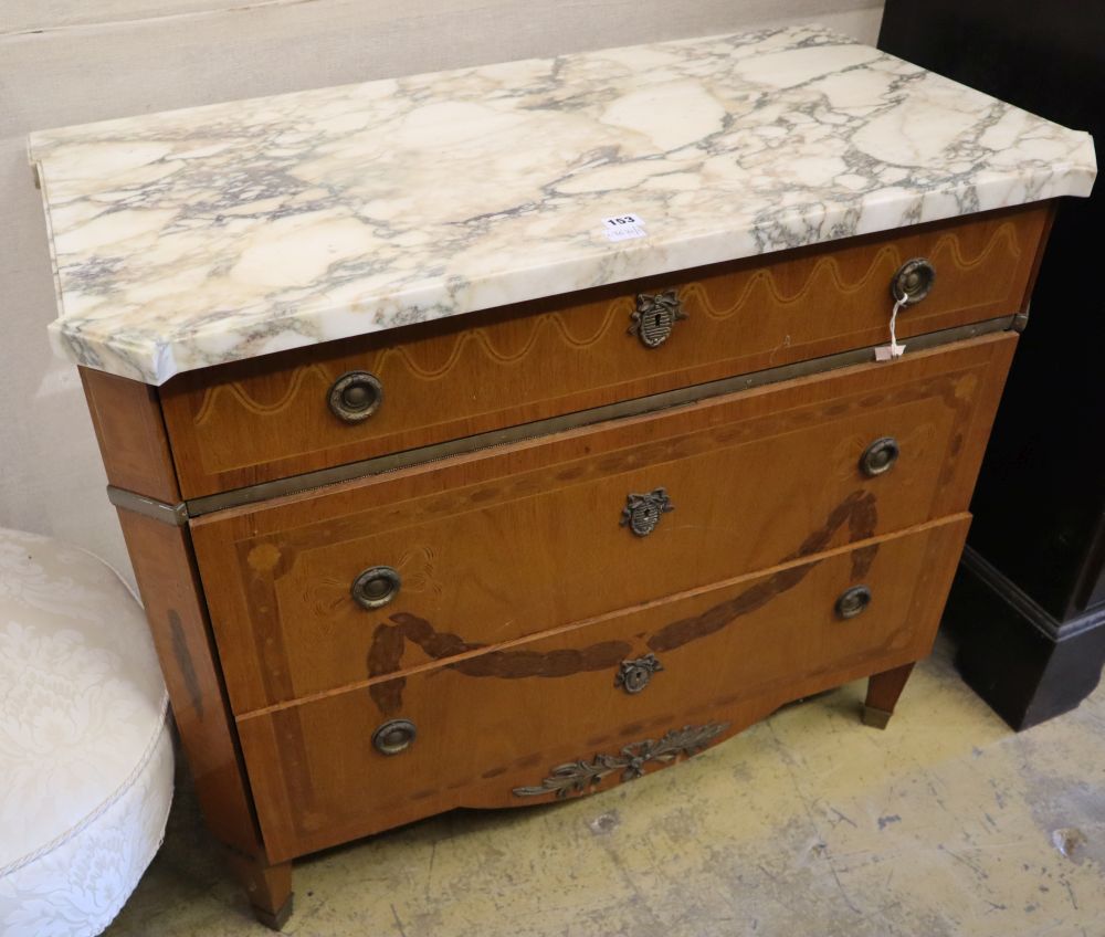 An early 20th century Continental marquetry inlaid walnut commode, with marble top, width 95cm